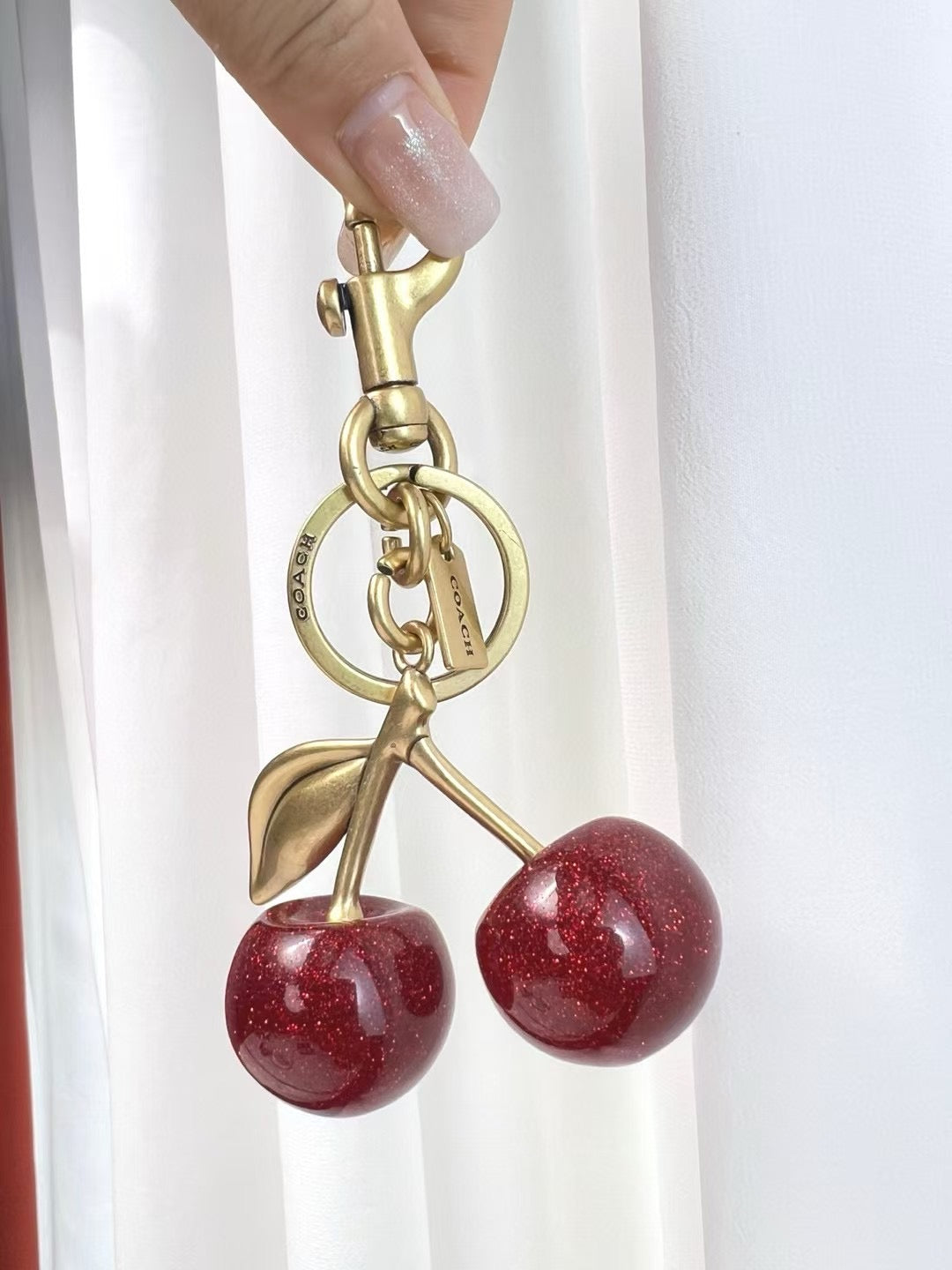 C*ach Cherry Charm Keychain