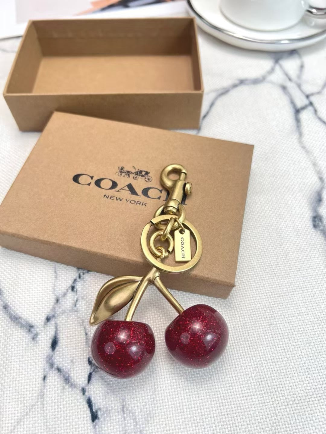 C*ach Cherry Charm Keychain