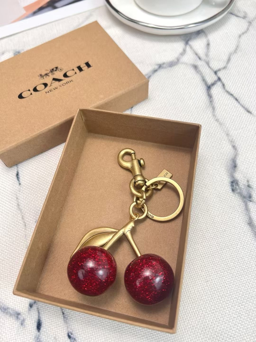 C*ach Cherry Charm Keychain