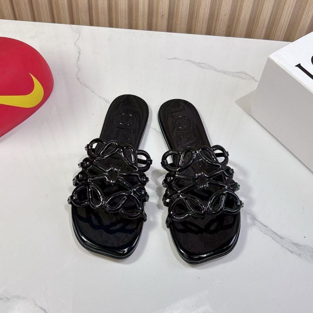 Lo*we Slippers