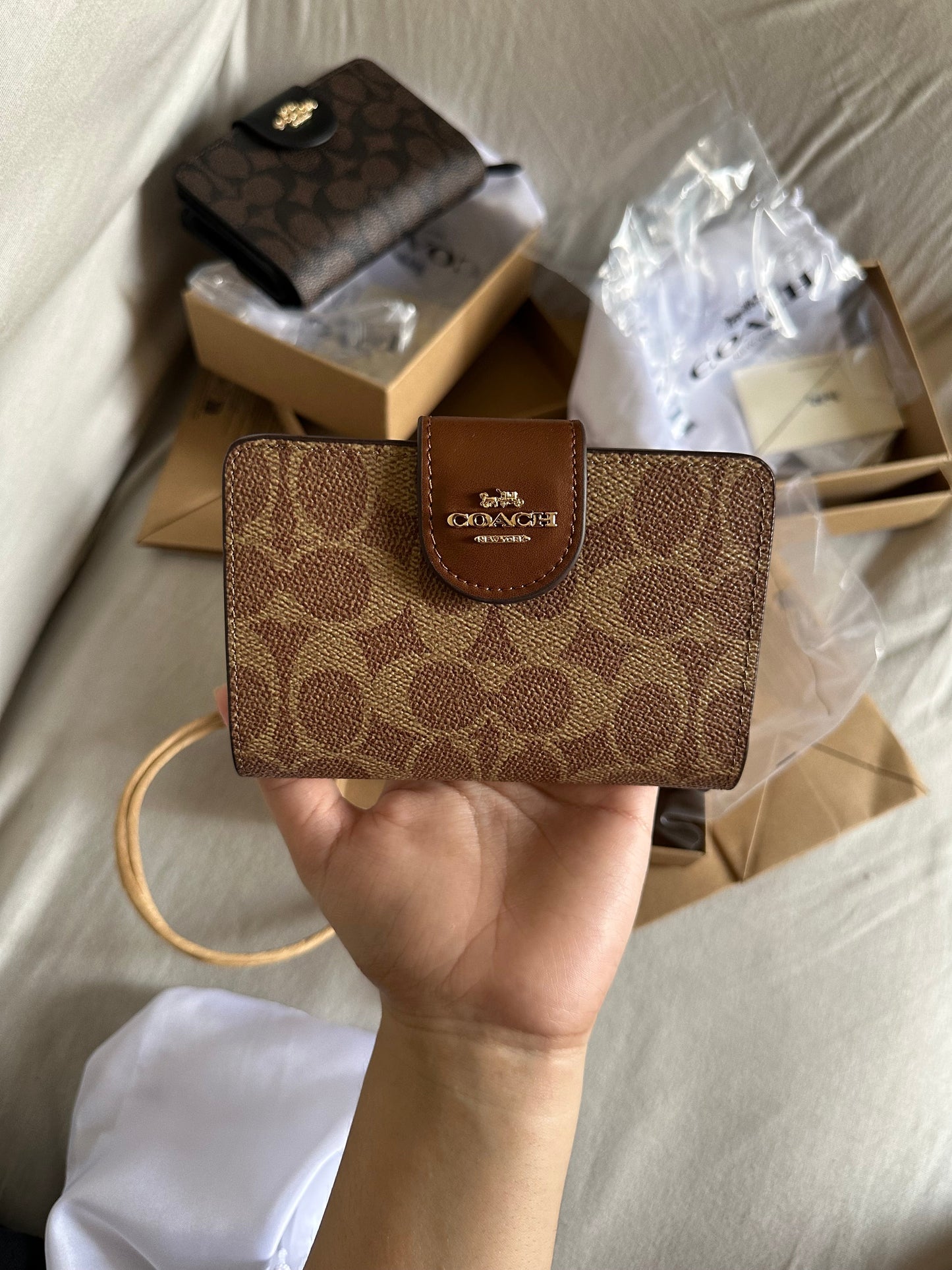 C*ach Wallets ( 3 colours )