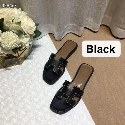 H*rmes Slipper in Black