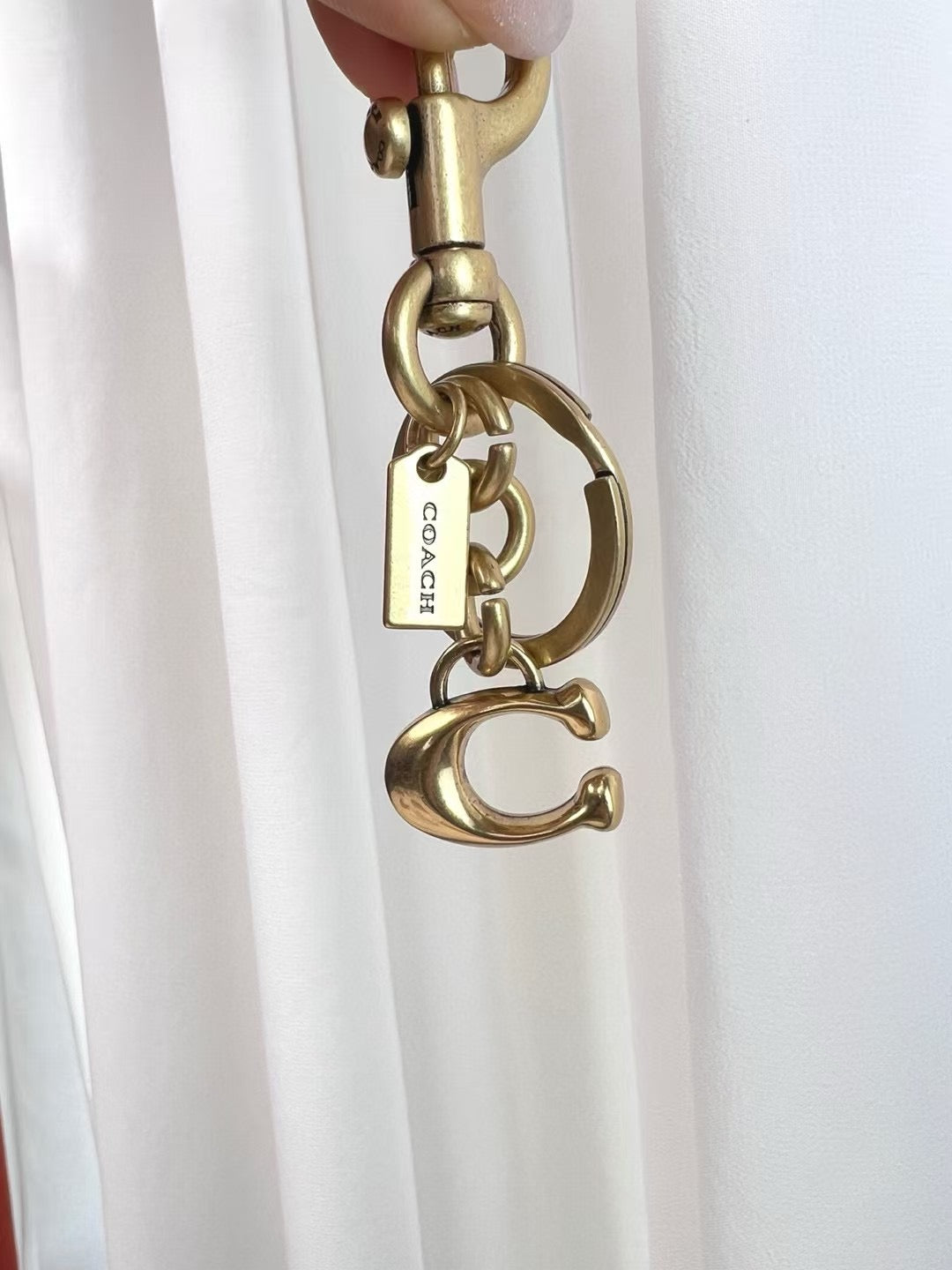 C*ach keychain