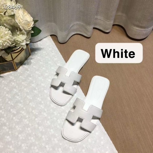H*rmes Slipper in White